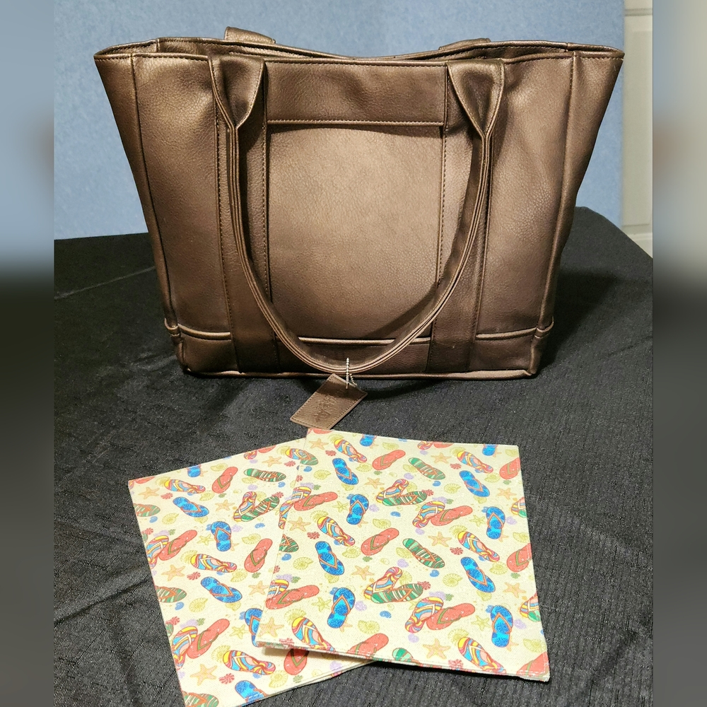 Turtle Bags brown faux leather tote with 2 sandal inserts.